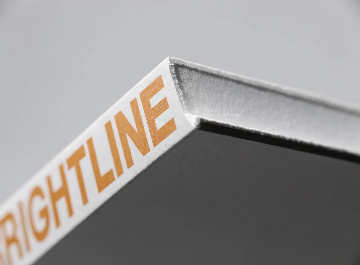 Close view of a PVC board corner showing the solid core and the square cut edge
